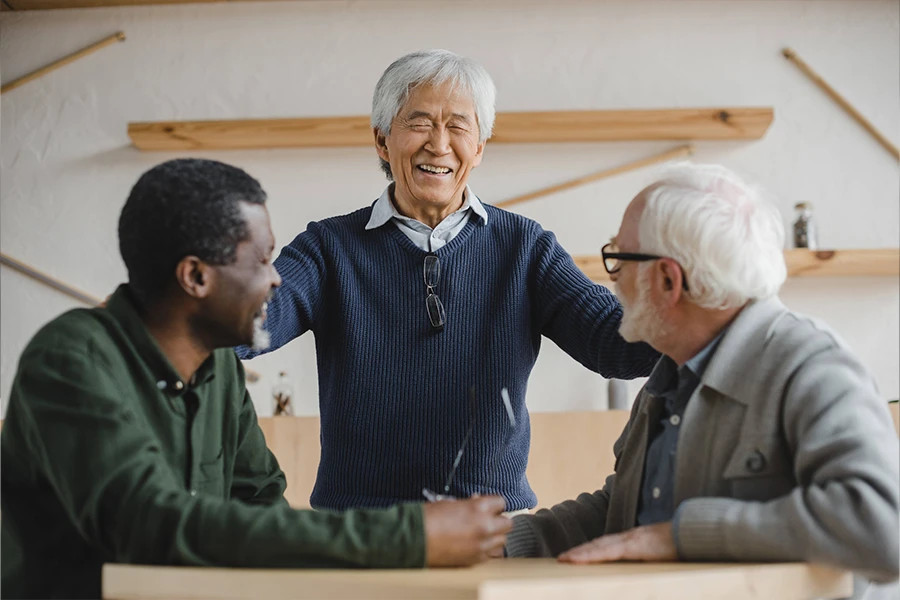 Three Men Laughing and Joking